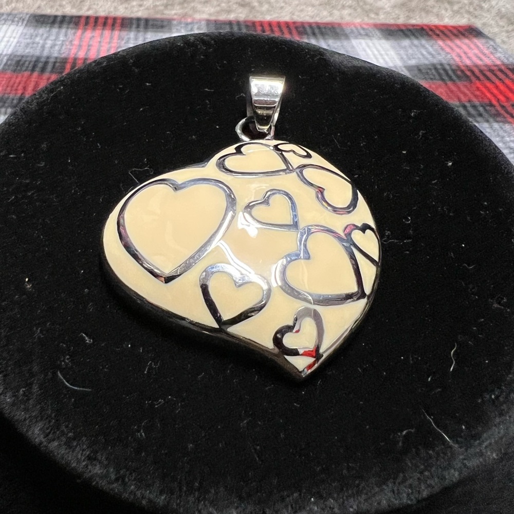 Silver and Cream Color Heart Pendent